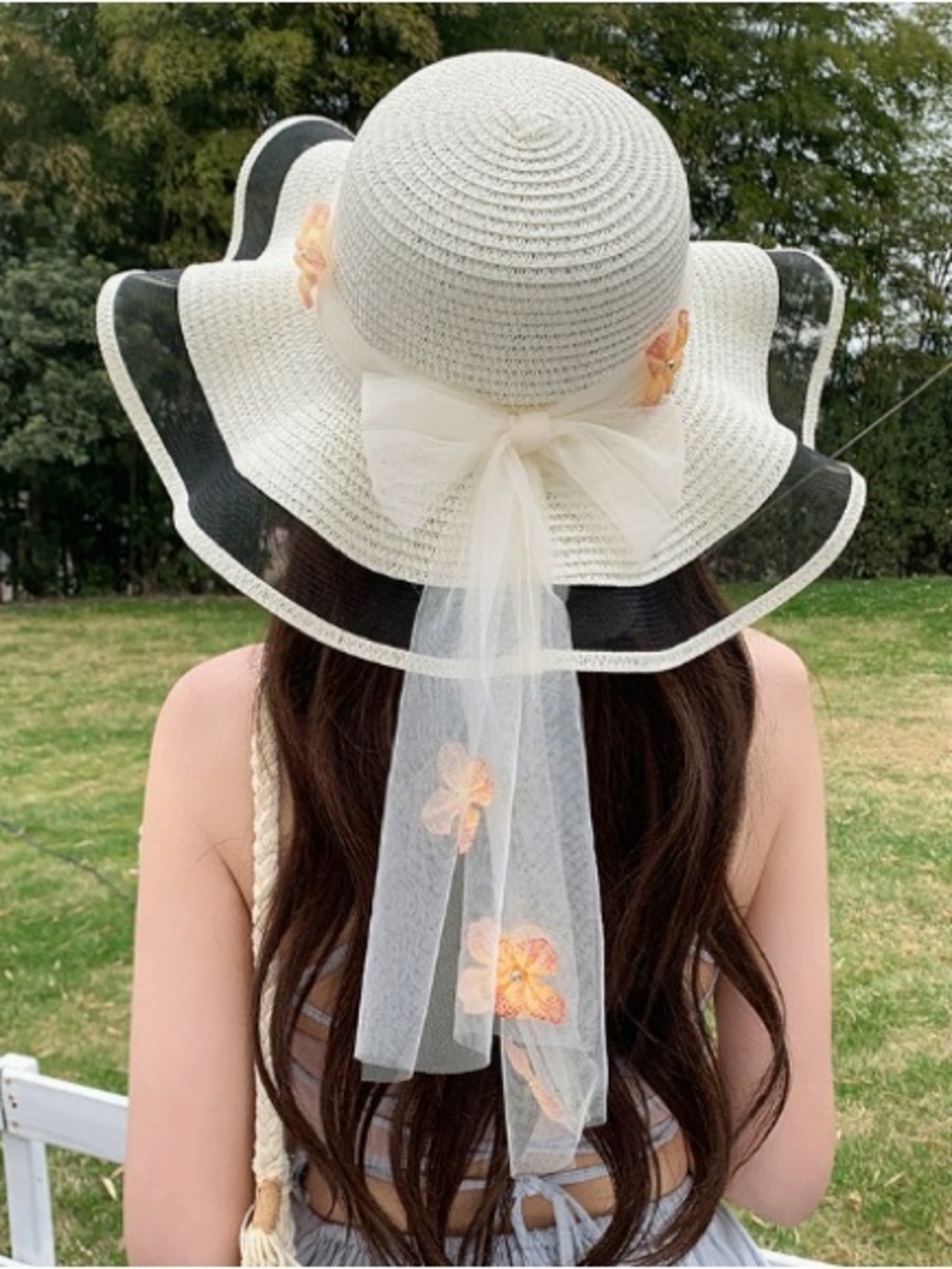 Elegant Cream Wide-Brim Sun Hat with Tulle Bow and Floral Accents